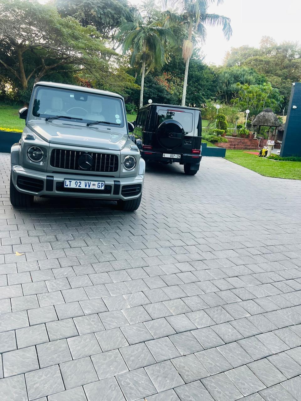 Vehicles parked at Zenz BnB during a private function